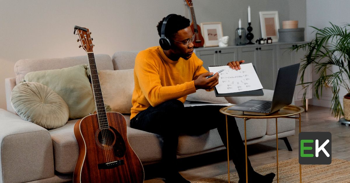 A men teaching online guitar lessons