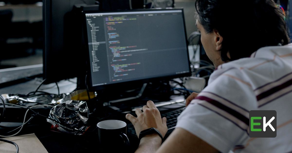 Men Writing a Code
